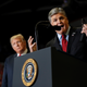 U.S. President Donald Trump listens as Sean Hannity from Fox News speaks at a campaign rally in Missouri
